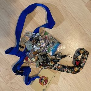 Bundle of Disney pins and two lanyards